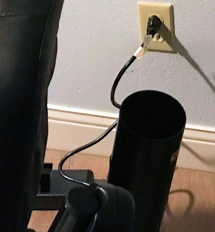 Pride Mobility Charger Plugged into Electrical Outlet