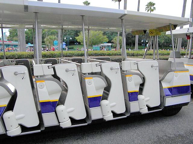 Side View Of A Parking Lot Tram With The Doors In A Closed Position