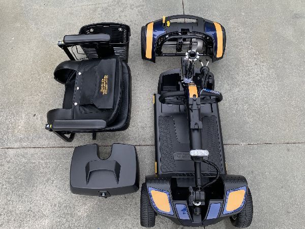 Disassembled Pride Mobility Go-Go Sport 4-wheel scooter