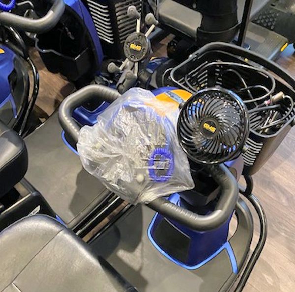 Image showing shower cap covering the electrical controls of Victory 10 Mobility Scooter