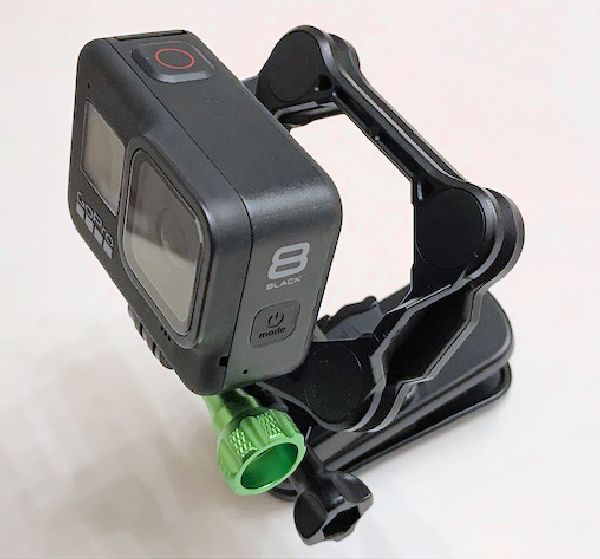 Image of GoPro on SNAP Mount Attached to Adapter and Swivel Clip Mount Thumbscrews Visible