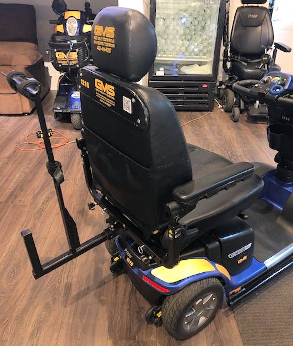 Image Of A Pride Mobility Walker Holder Mounted On A PrideVictory 10 Mobility Scooter