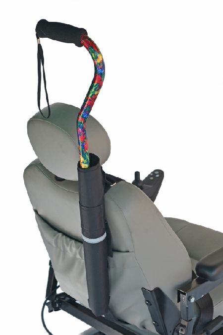 Here is an image of a cane holder on the seatback of a power wheelchair