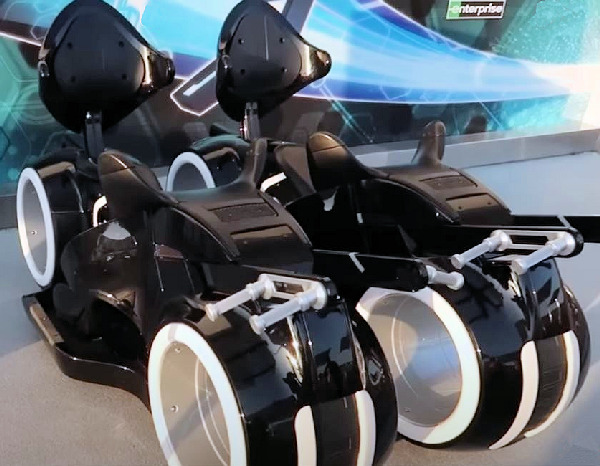 Two Tron Lightcycles on display